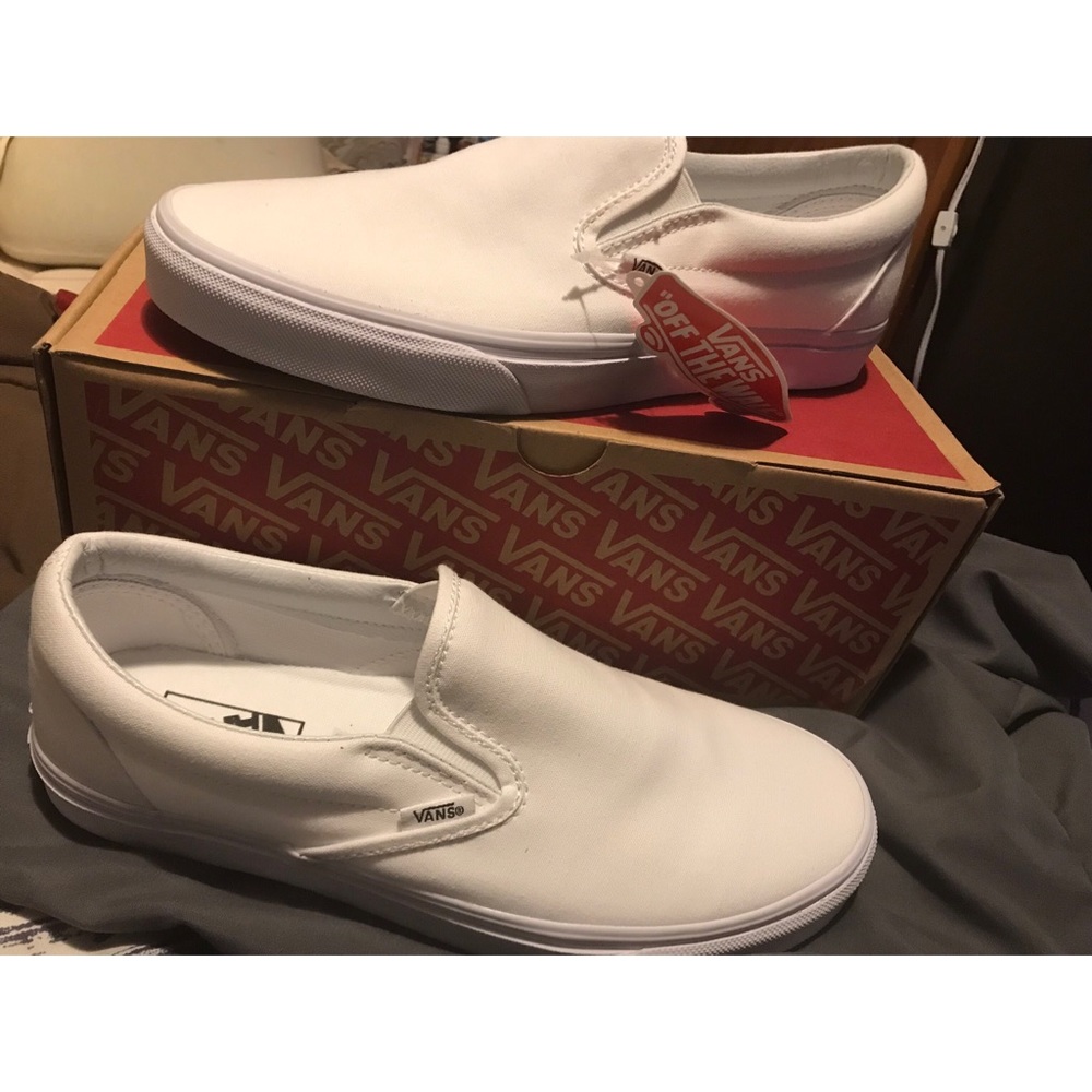 White slip on Vans